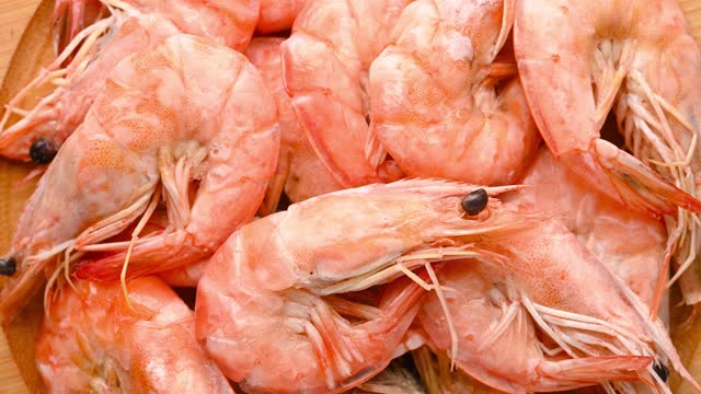 top view fresh cooked shrimps rotating at horizontal composition