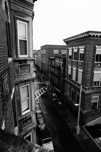 Capturing prince street in a light snow. Taken out the window of an apartment in Boston.