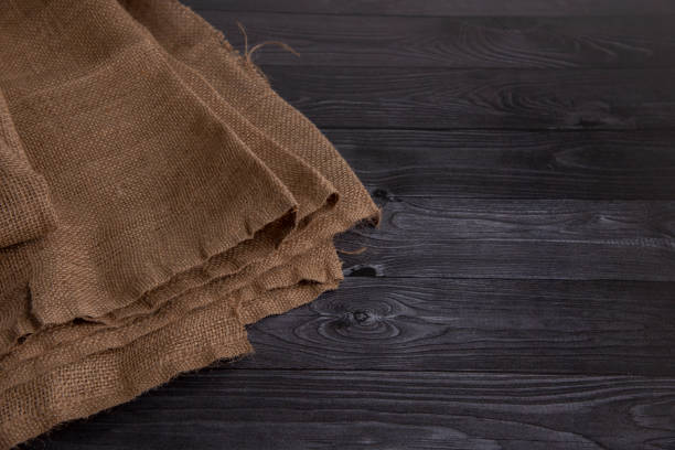 istock Sackcloth  texture on the wooden surface dark color.wallpaper . copy space. space for your text. 1469140431