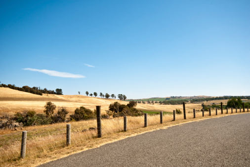 Road and farmland near Corra Lyn, Tasmania, Australia