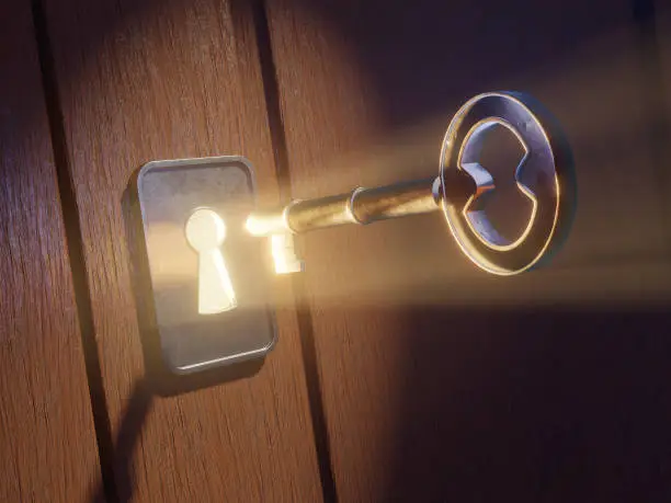 Photo of Light filtering through a keyhole