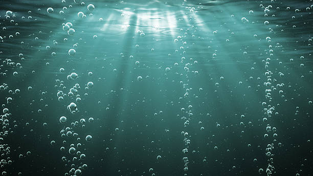 istock Dark green ocean waves from underwater with bubbles 146914711