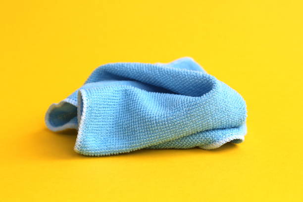 istock A blue rag for cleaning lies on a yellow background. 1469147134