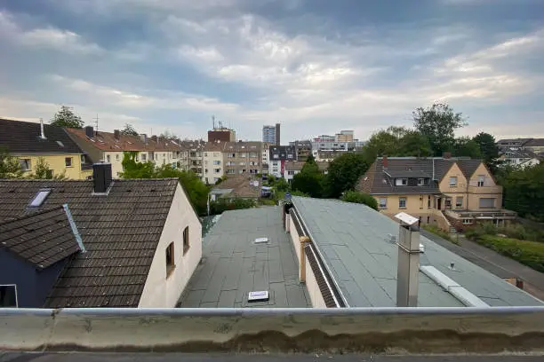 Scenic view cityscape of Leverkusen district Wiesdorf, Germany against cloudy sky