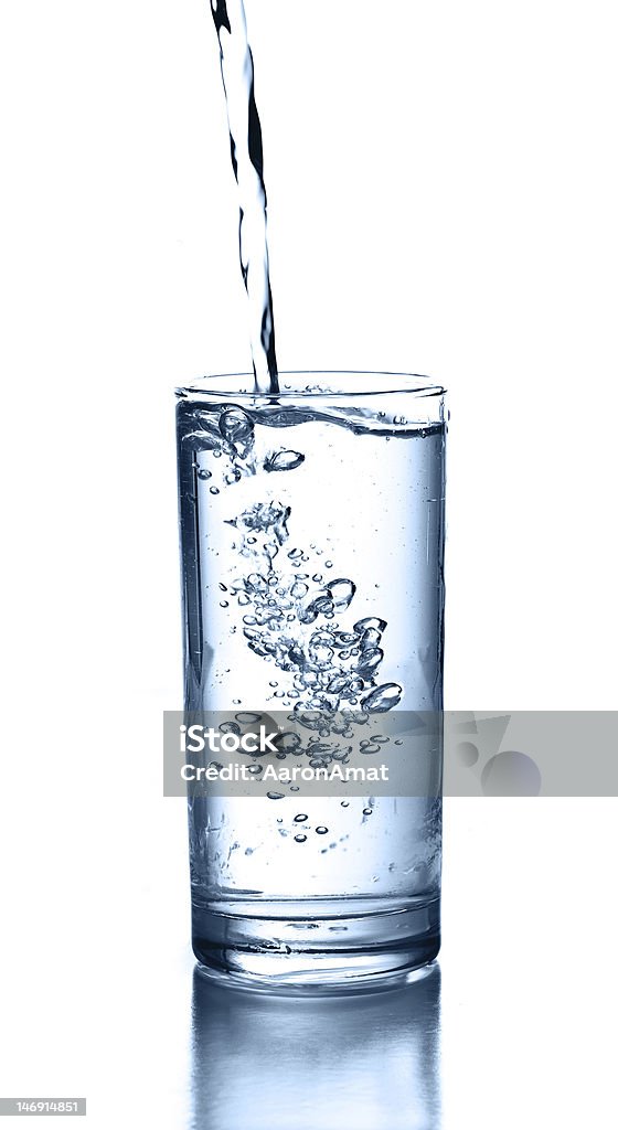 water glass Water pouring into glass. Activity Stock Photo