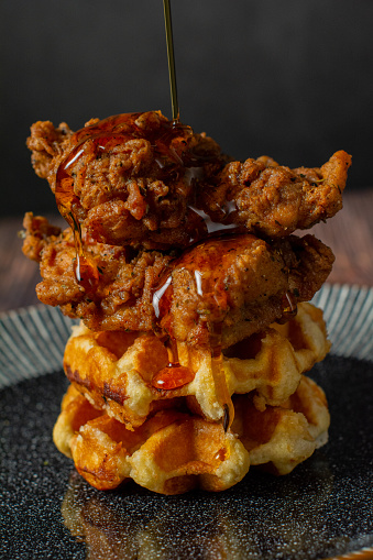 Stack of fried chicken and homemade waffles
