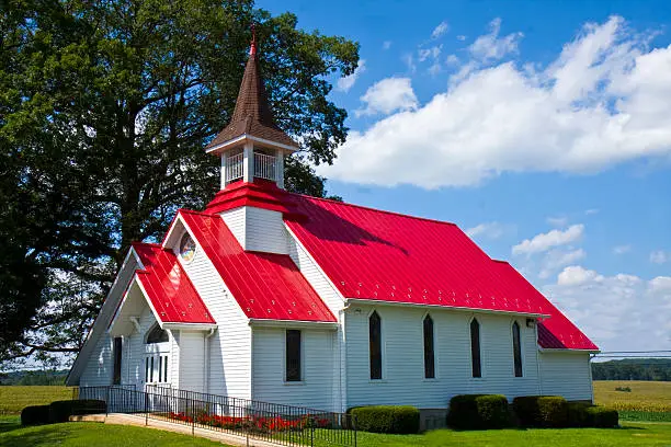 Charming and quaint church with red roof int he country