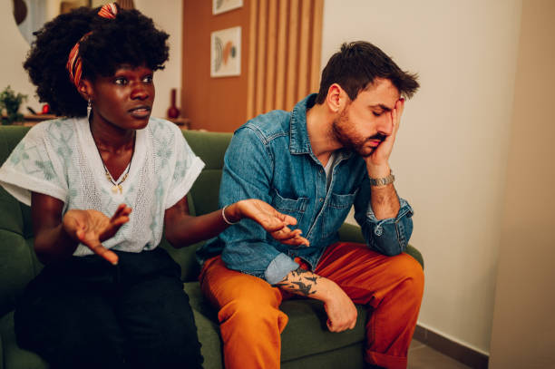 istock Diverse couple on a therapy session in a psychologist office 1469152156