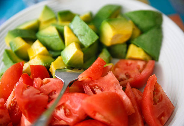 istock avocado and tomato salad 146915290