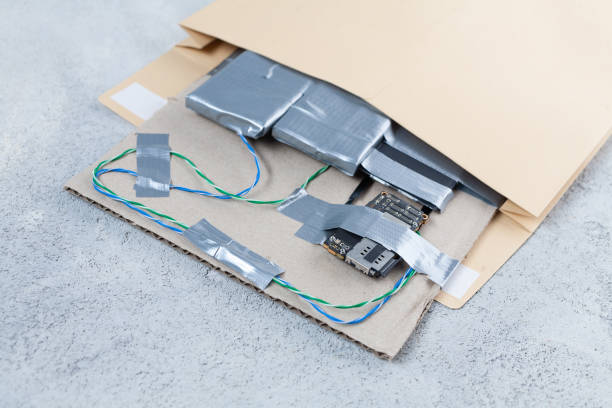 istock Mail bomb IED - Improvised Explosive Device with c4 and cell phone module in envelope 1469153882