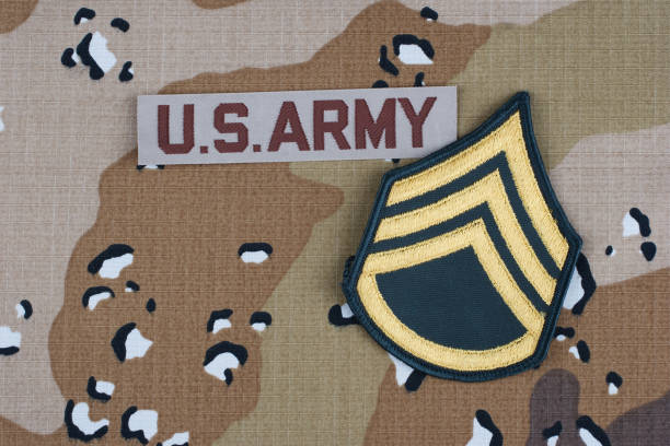 istock US ARMY battle dress uniform with staff sergeant rank patch 1469154066