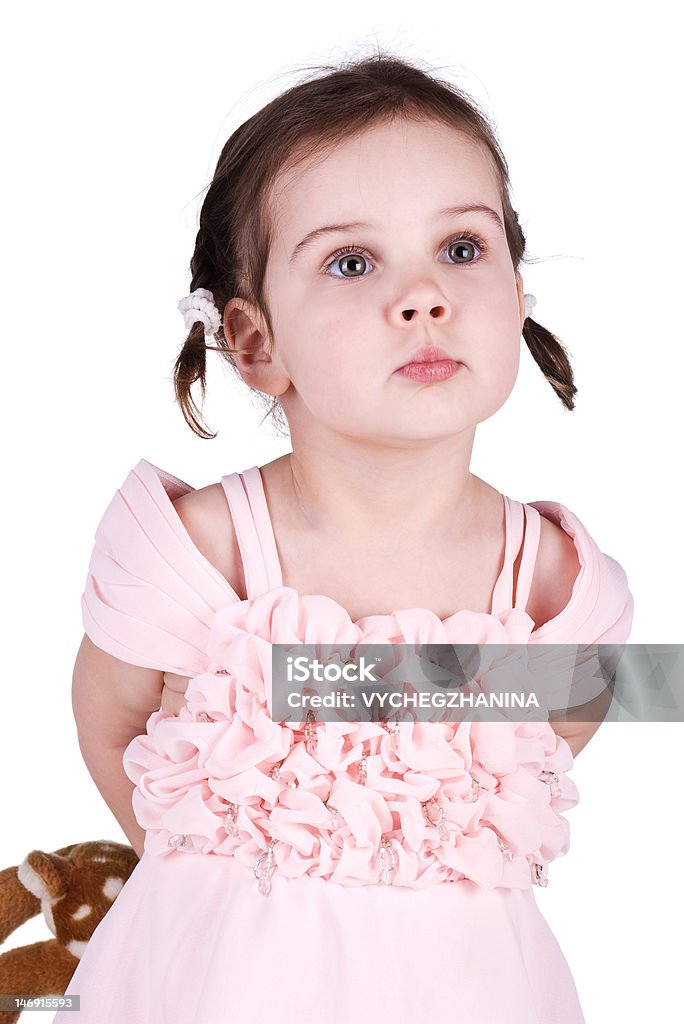 Маленькая девочка, сокрытия ее игрушка - Стоковые фото 2-3 года роялти-фри