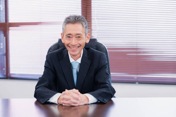 istock A smiling company executive in the boardroom 1469156403