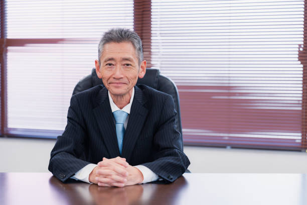 istock A smiling company executive in the boardroom 1469156410