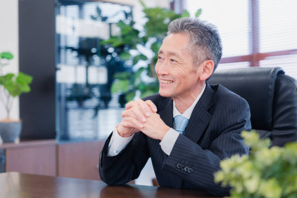 istock A smiling company executive in the boardroom 1469156443