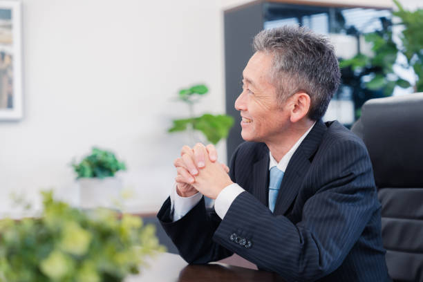 istock A smiling company executive in the boardroom 1469156454