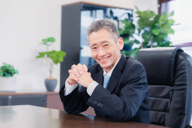 istock A smiling company executive in the boardroom 1469156466