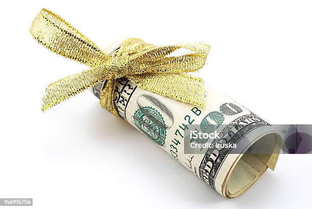 One Hundred Dollar Bills With Gold Ribbon Stock Photo - Download Image Now - Currency, Incentive, Paper Currency