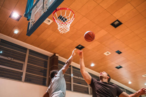 istock Diverse Basketball Players Going For A Rebound 1469157907