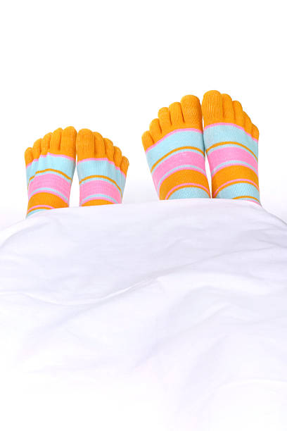istock legs with colorful socks 146915823