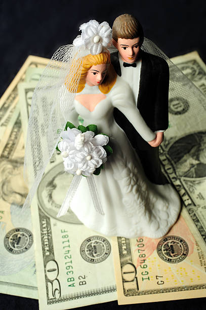 istock bridal couple with money 146915911