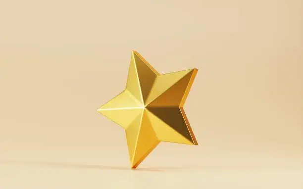 Photo of Shiny gold star isolated background