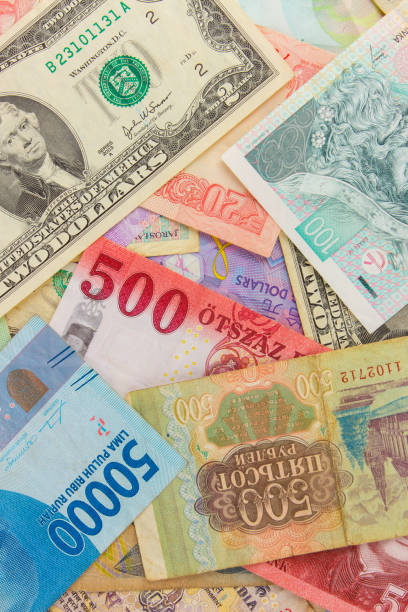 istock Background from different money banknotes from all over the world 1469160555