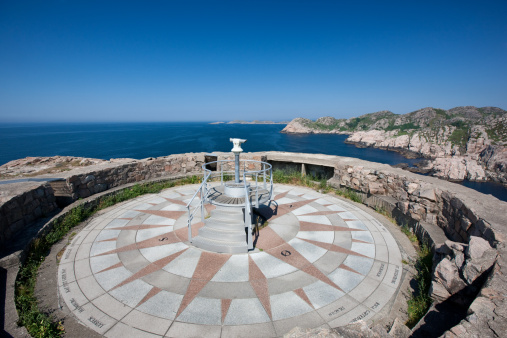 Compass at Lindesnes lighthouse in Norway, most southern destination of this European country