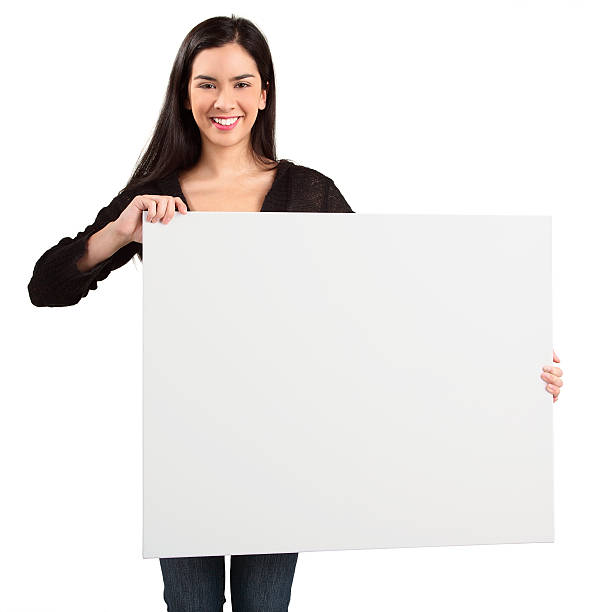 istock Brunette woman holding up white sign on white background 146916385