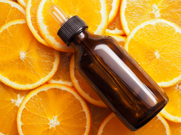 istock Anti-aging serum with vitamin C, orange slices 1469164776
