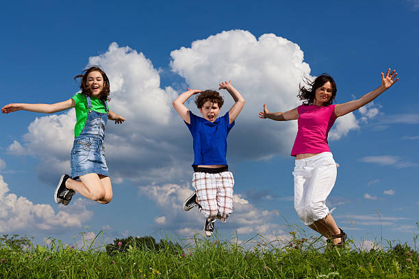 istock Active family jumping outdoor 146916660