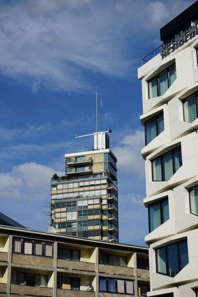 istock two buildings with different styles of windows on them near each other 1469167909