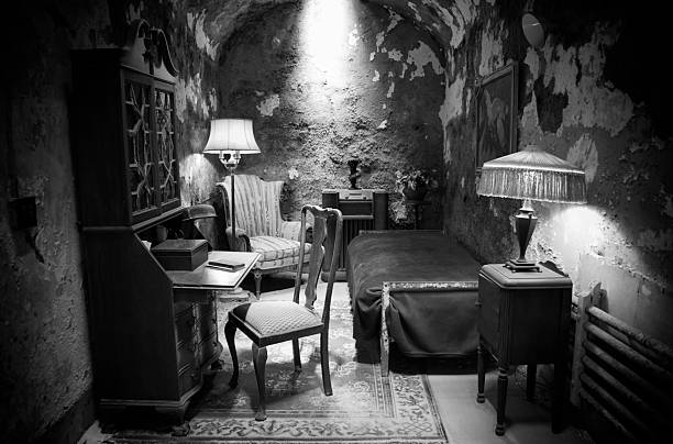 Al Capone's old prison cell in black and white stock photo