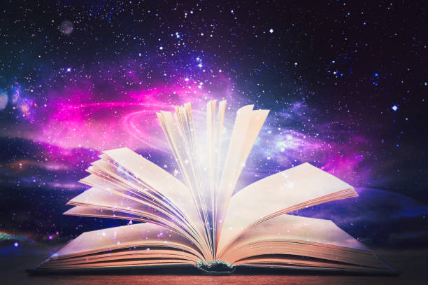 istock Open book with glitter overlay and beautiful universe on background 1469168963