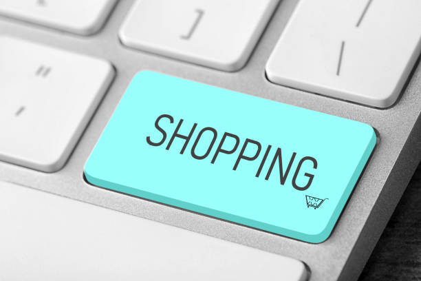 istock Online store. Turquoise button with word SHOPPING on computer keyboard, closeup 1469169162