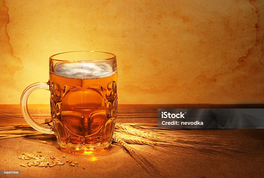 beer on sacking beer on sacking with wheat still-life Alcohol - Drink Stock Photo