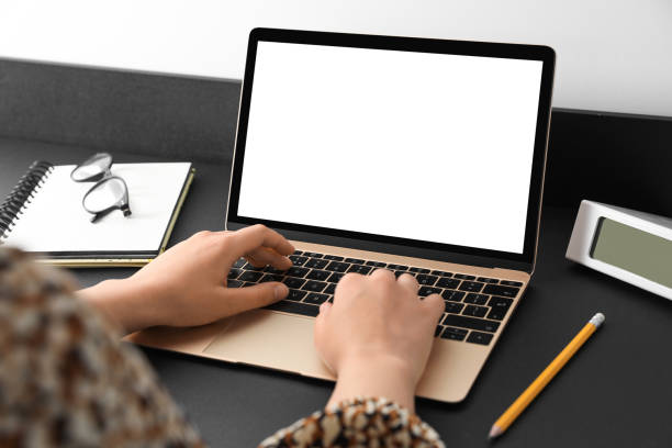 istock Woman working on modern laptop at black table, closeup. Space for design 1469171208