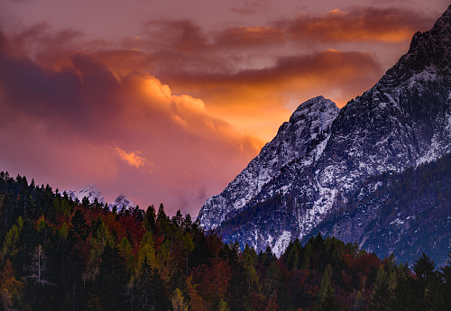 Sunset view of snowcapped mountain range in autumn season at Slovenia. Photographed in medium format.