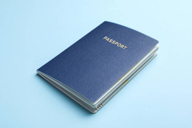 istock Blank passport on light blue background, closeup 1469171768