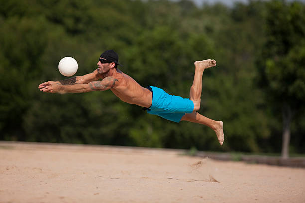 istock Male Playing Sand Volleyball 146917228