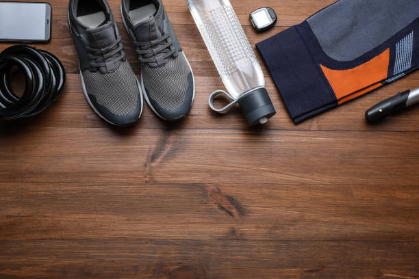 istock Flat lay composition with different cycling accessories on wooden background, space for text 1469177589