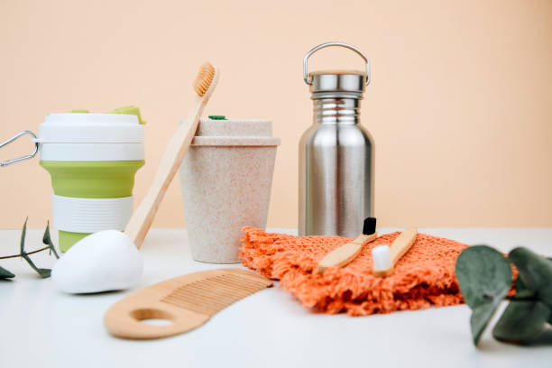 istock Set of eco friendly devices. Zero waste concept. A tin bottle for water and a mugs for coffee, tea, wooden brushes 1469181201