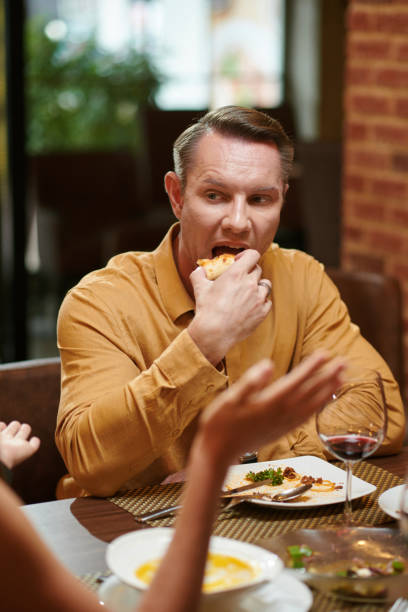 istock Esting Man Listening to Wife 1469182230