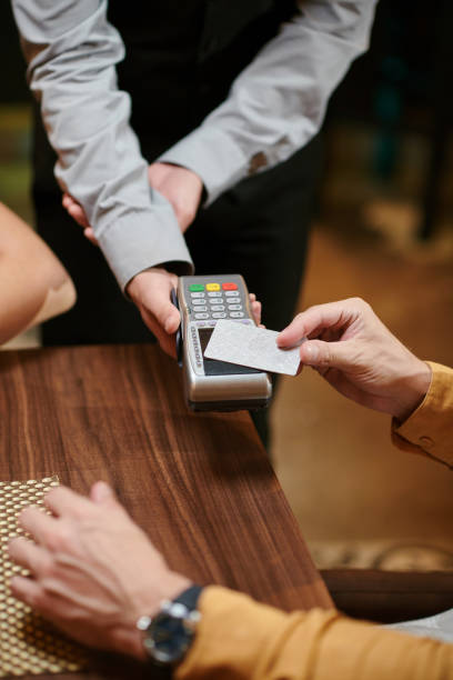 istock Man Paying with Contactless Card 1469182244