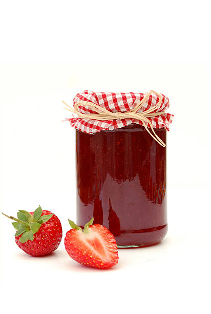 istock Classically decorated jar of strawberry jam on white 146918651