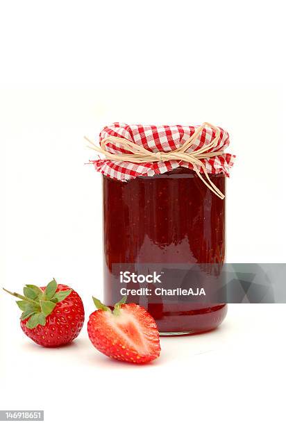 Classically Decorated Jar Of Strawberry Jam On White Stock Photo - Download Image Now