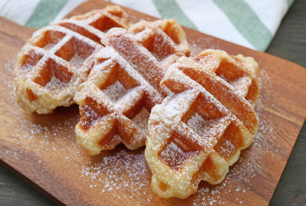 istock Mouthwatering Croffle or Croissant Waffles Sprinkled with Powdered Sugar 1469187765