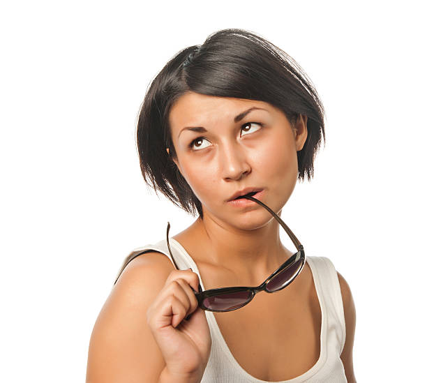 istock Thoughtful pretty girl with sunglasses 146918847