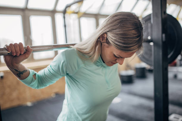 istock Woman weightlifting 1469189696