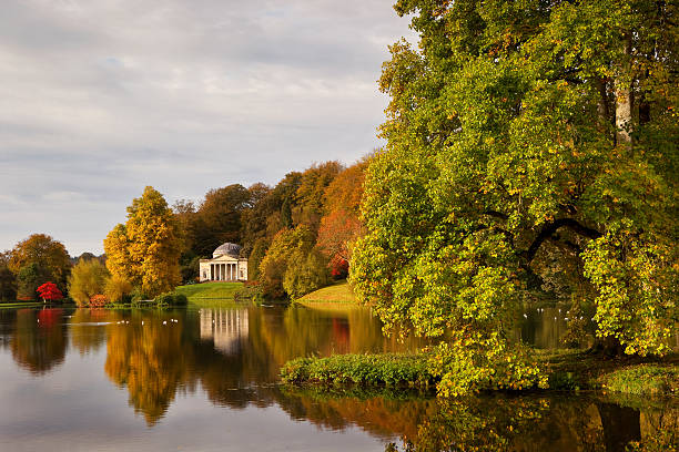 Stourhead Gardens, Wiltshire, UK In autumn, a view across the lake to the Pantheon at Stourhead Gardens, Wiltshire, UK national trust photos stock pictures, royalty-free photos & images